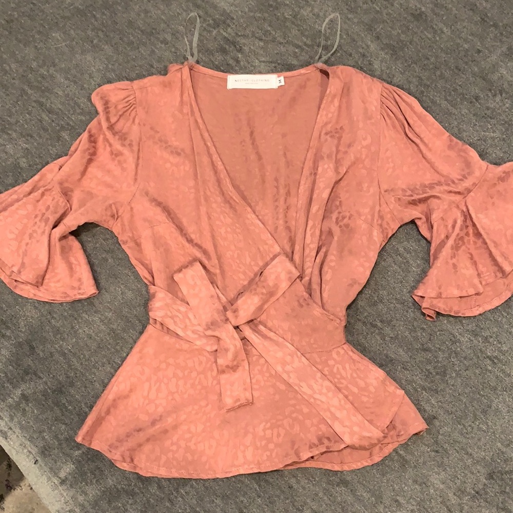 Selling a hardly worn Nectar clothing top!